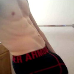 Strongly Built OnlyFans Model in Swimwear Showing Abs