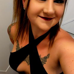 Lex, a model from Texas in a seductive outfit.