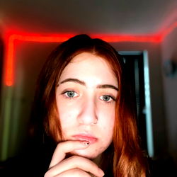 Pensive Alice in a Room with Neon Accents