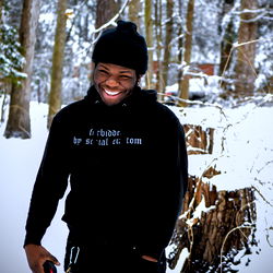 Smiling OG Juan in Snowy Park