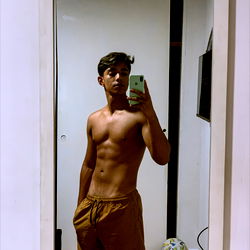 Stylish Fitness Model in a Mirror Selfie