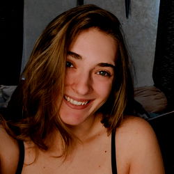 Nicole Renee, young woman with blonde hair and a warm smile posing for the camera. 📸