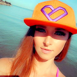 Milli Mag, Canadian OnlyFans Model in Beach Cap and Neon Orange Hat