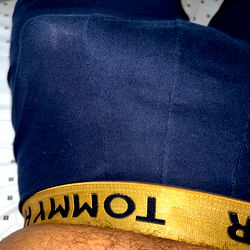 Aleksander, a Fitness Enthusiast Showcasing His Muscles