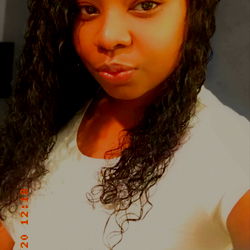 OnlyFans Model Charnele, A Striking Portrait in White