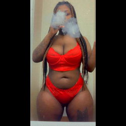 OnlyFans Model Spiritual $LUT with Candy Cane Hair and Red Lingerie