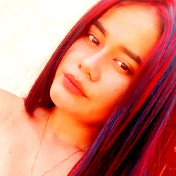 Young Woman with Red Hair and Colorful Makeup