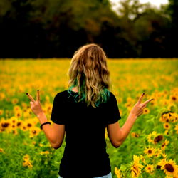 Peaceful Pastoral Scene with Model in Field of Sunflowers