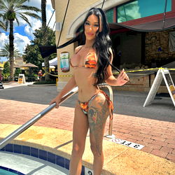 Hot Model in Bathing Suit by Pool