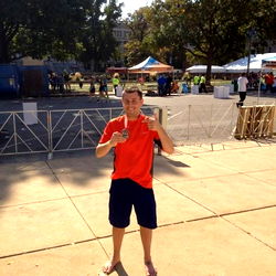 A Man Posing on a Tennis Court