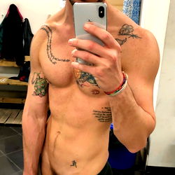OnlyFans Model Taking a Selfie in the Gym