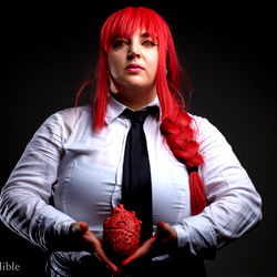 Vividly Costumed Cosplay Model with Heart