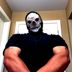 Strongly Muscled Man in Skull Mask and Onlyfans Model Name