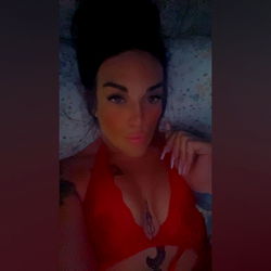 OnlyFans Model Anastasia, Showing Her Busty Beauty in Red Lingerie