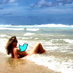 Beautiful Model Sunbathing on Beach