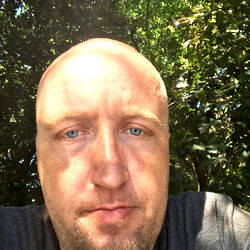 A Man with A Head Shaved