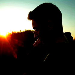 Reflective Sunset Silhouette