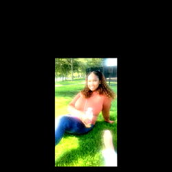 Woman in Park Taking Selfie