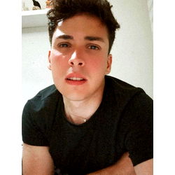 An image of Alex, a young man with short hair.