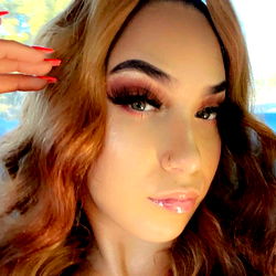 A Stylish Beauty's Photo with Vivid Makeup and Bold Hair