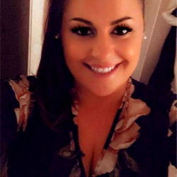 Smiling Woman in Floral Dress