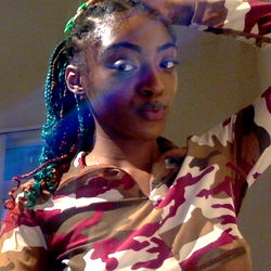 Model in Camo Jumpsuit