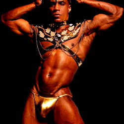 OnlyFans Model Andres Olave: Erotic Photos and Exotic Dancing in Sleeveless Costume