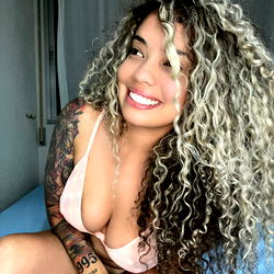 Young Woman with Long Hair and Tattoos