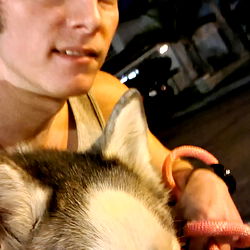 Cute Dog and Owner on the Street at Night