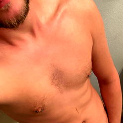 The OnlyFans Model Trox in a Shirtless Selfie