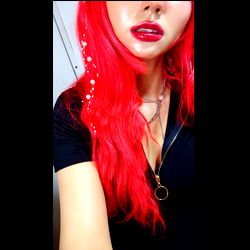 Model AkumaReiko's Vivid Red Hair and Earrings