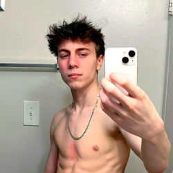 Shirtless Model Taking Mirror Selfie