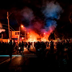 Protest and Fire at Night
