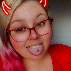 OnlyFans Model with Pink Hair and Red T-shirt