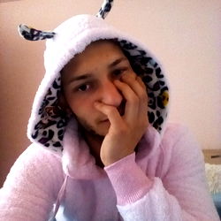 Man in Pajamas with Hoodie and Antlers