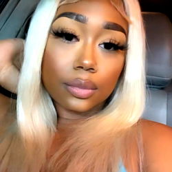 A Chinese-based OnlyFans model sharing a selfie on social media