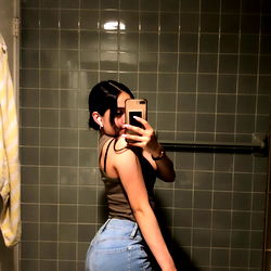 Miriam N, OnlyFans Model, in a Bathroom Mirror Selfie