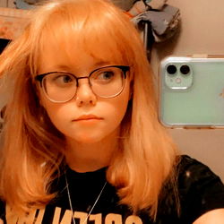 Girl with Blonde Hair and Red Eyes