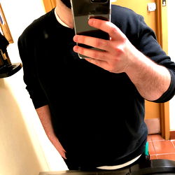 Man Taking Selfie in Bathroom