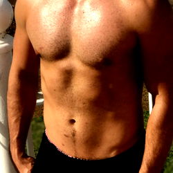 Shirtless Guy in Swimsuit on Poolside