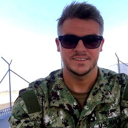 A Young Man in Military Fatigues