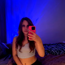 LilRaeRae, OnlyFans Model in a Blue Room