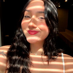 A Young Woman in a White Tank Top