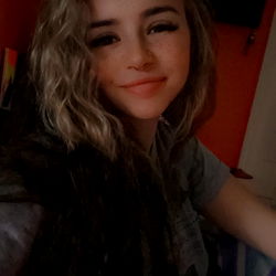 Harley, a young woman sharing her life through her OnlyFans account.