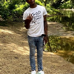 Inkyyy - Youthful Rapper Standing by River