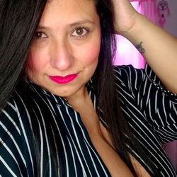 Arelys, the beautiful brunette in a striped shirt!