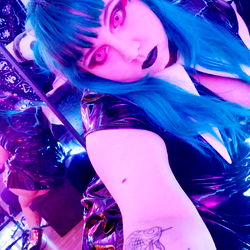 Model in Cosplay Costume with Tattoos