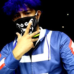 Jey-L from TABASCO, a young man with a vibrant sense of style