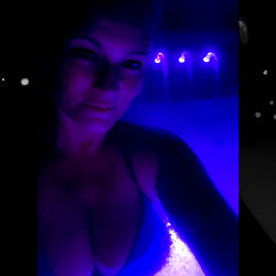 Glimpse into the Purple-Lit, Bikini-Clad Life of a Model