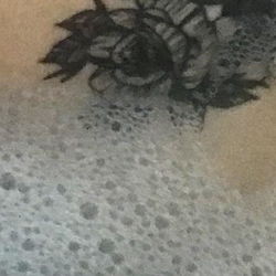 Black Tattoo on Back of Hand